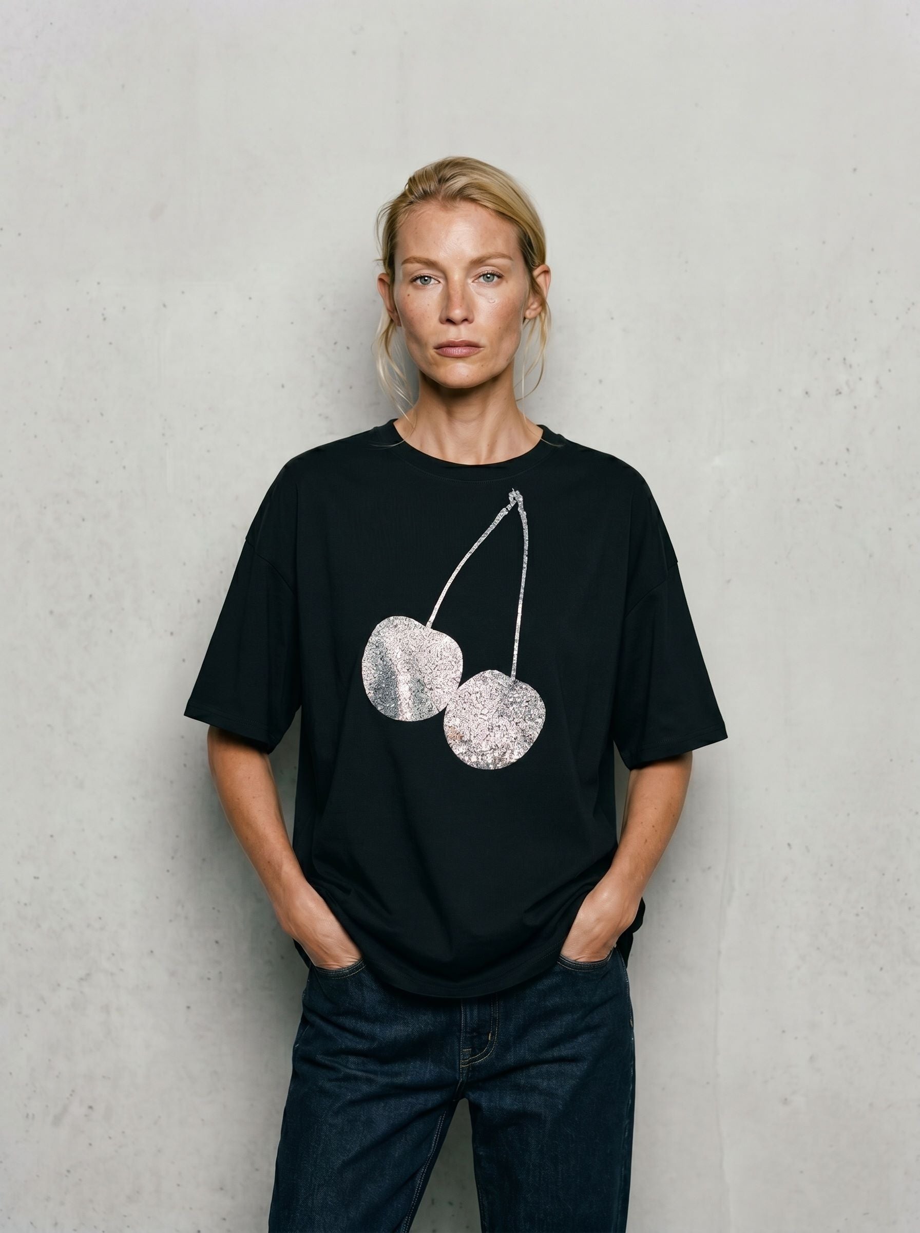 Woman wearing Cherry Diamond oversized black tee