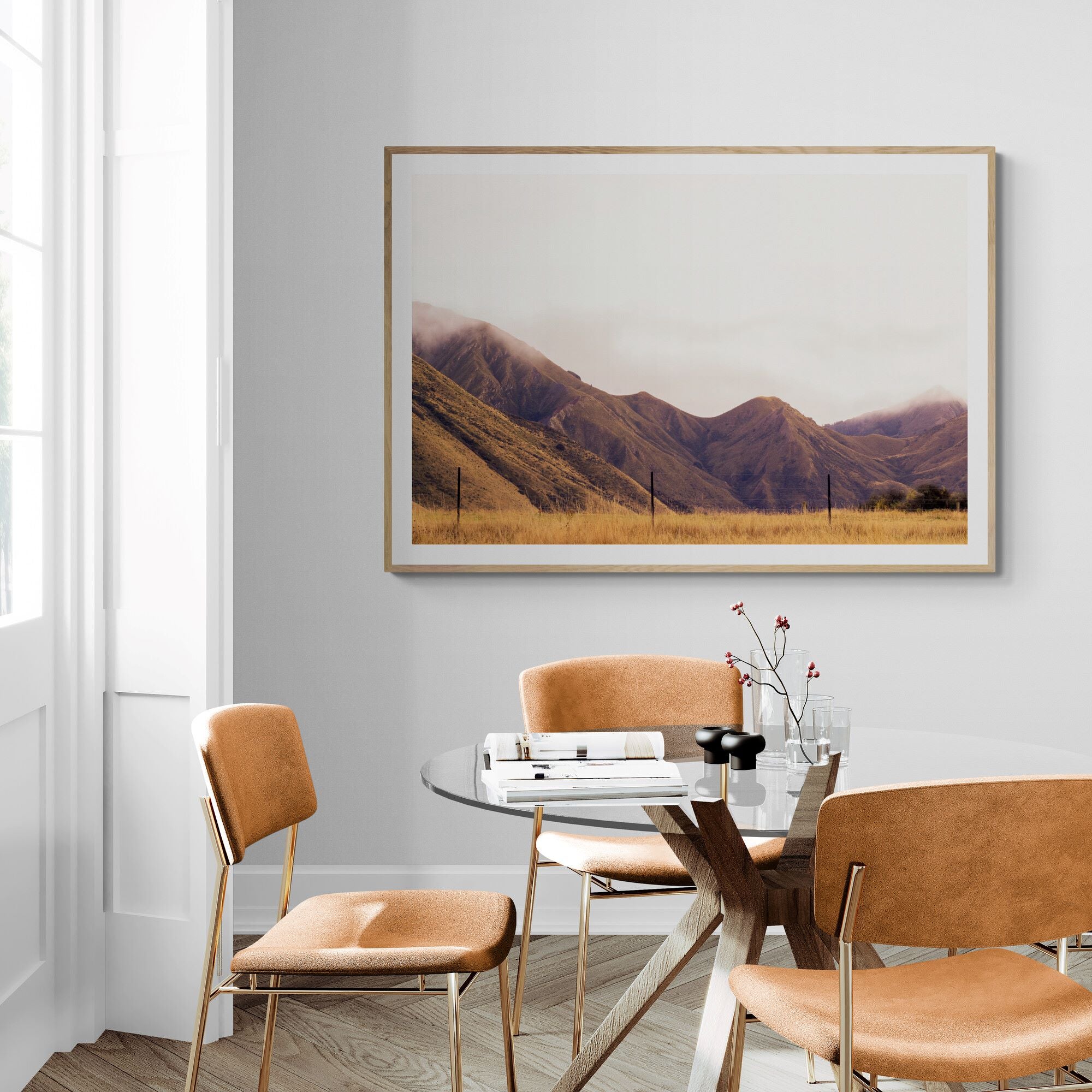 Golden Mountains Queenstown Print in oak frame in dining area by Kirsten Clark Art
