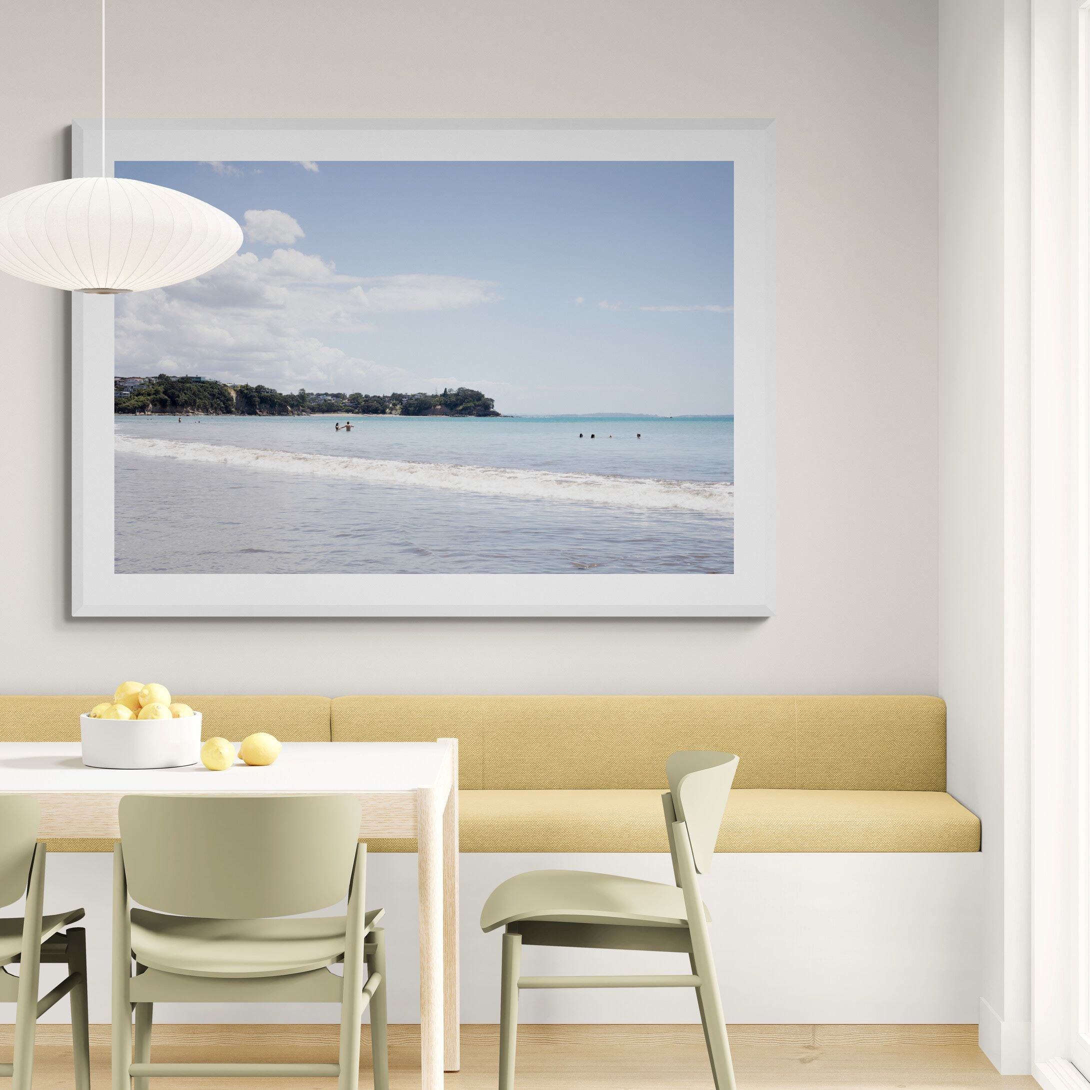 Milford Beach Summers Day print in dining area by Kirsten Clark Art