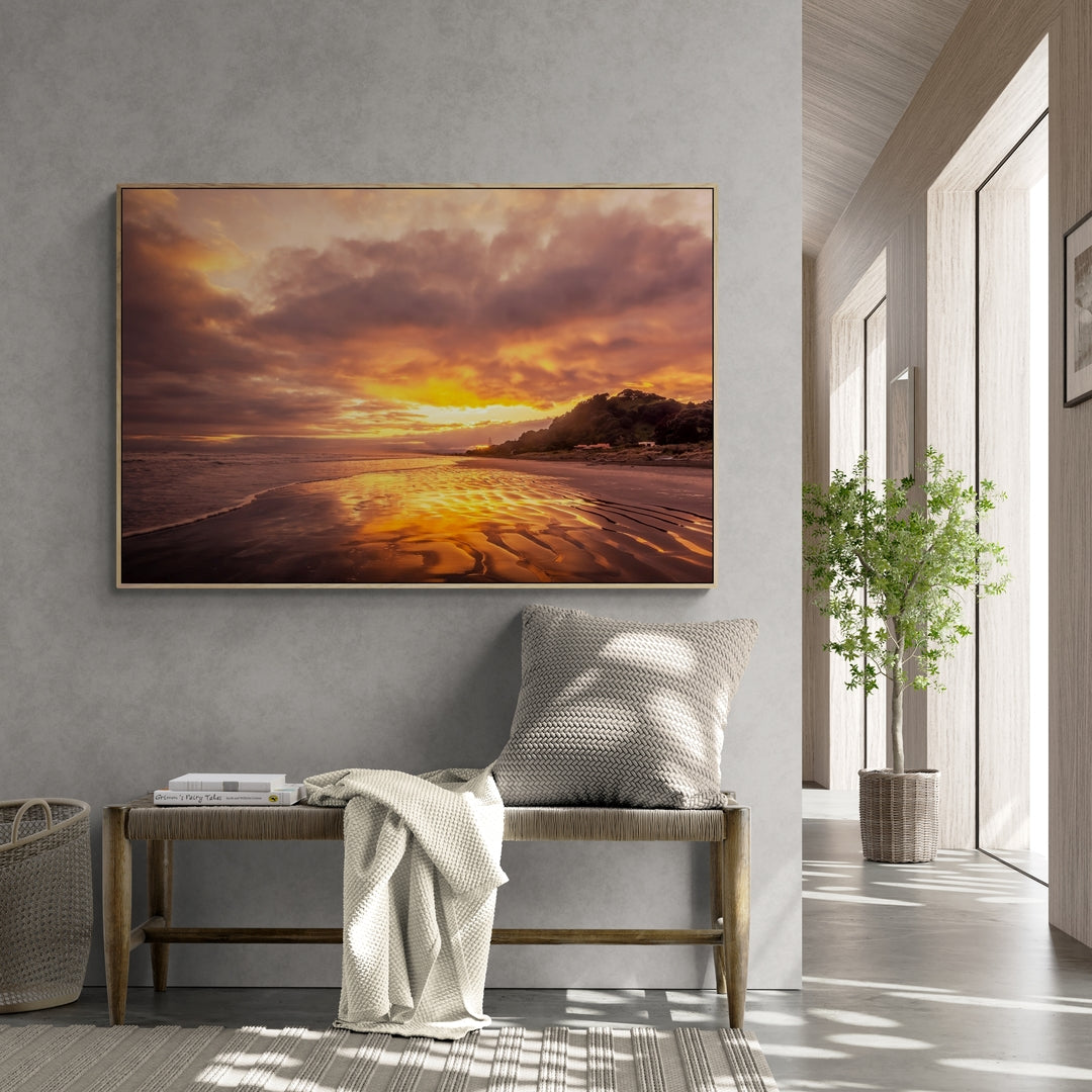 Ohope Beach liquid gold sunrise fine art canvas print with oak frame in foyer