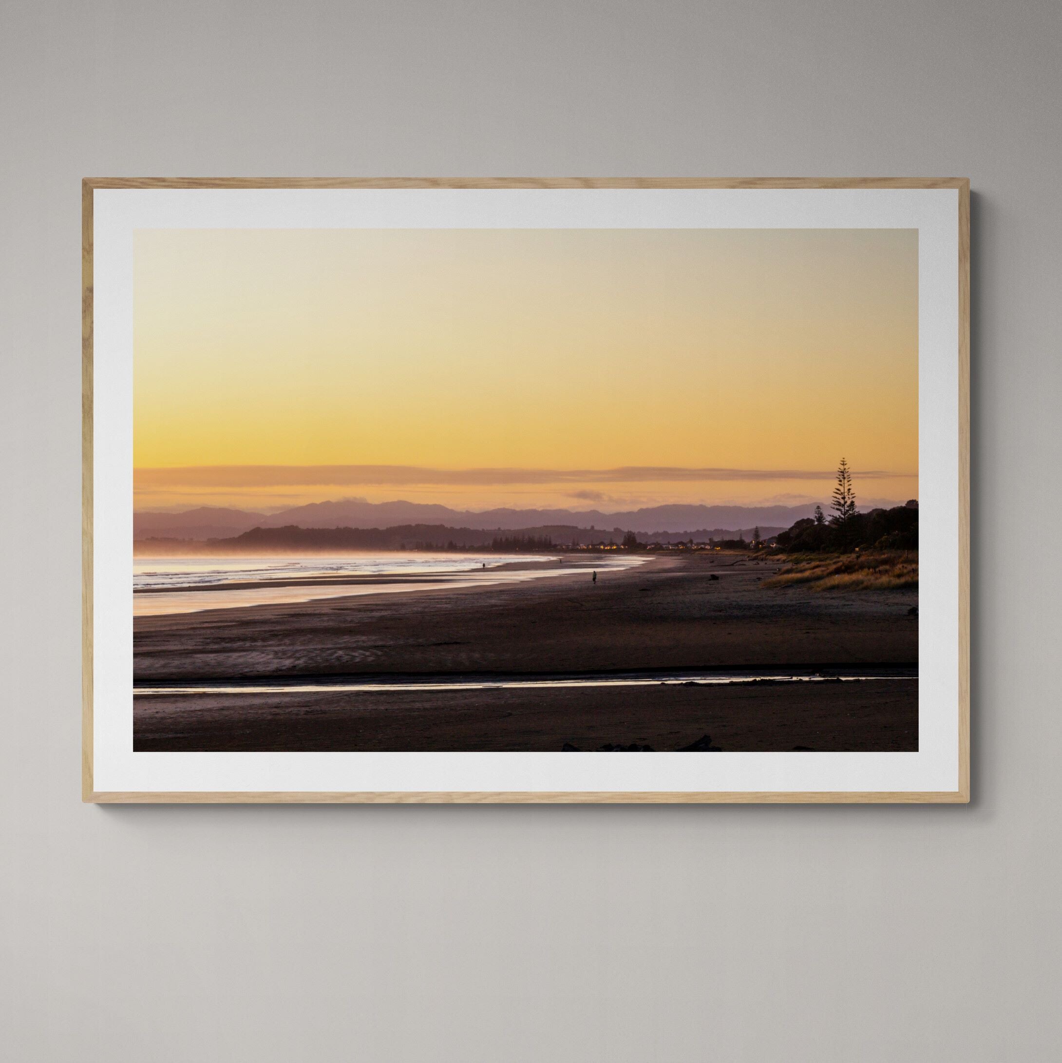 Ohope Beach sunrise print framed on wall by Kirsten Clark Art