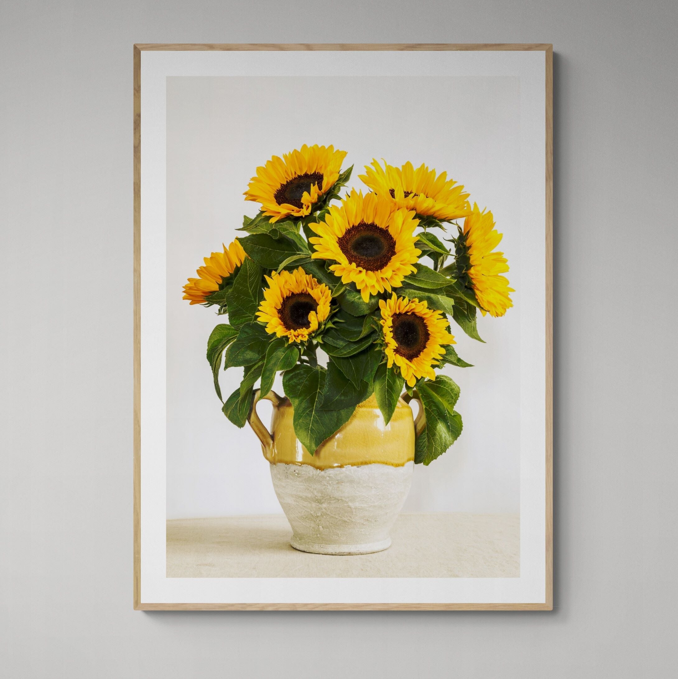 Sunflowers in a rusitic urn print framed on wall by Kirsten Clark Art