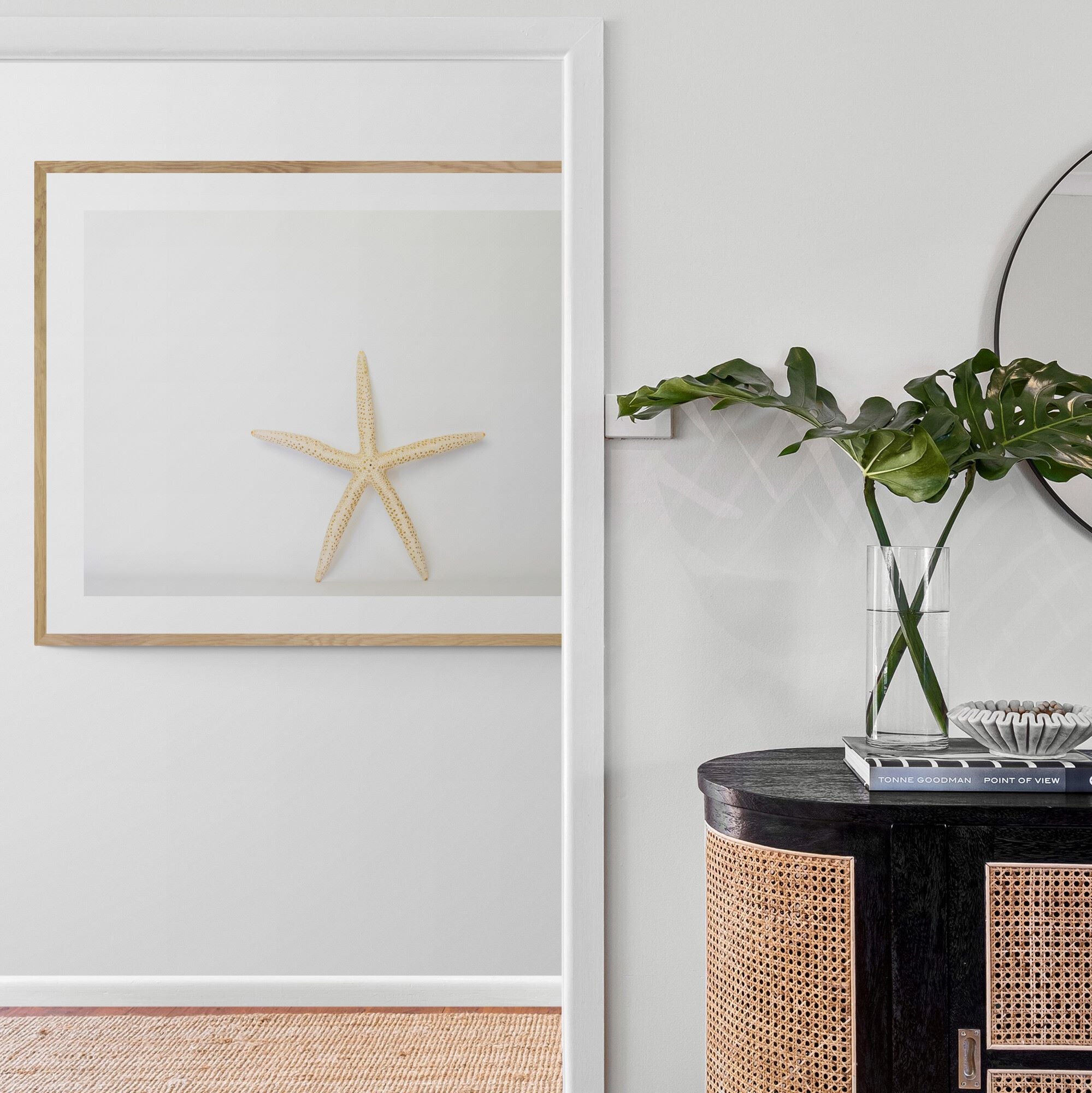 starfish print framed in hallway wall by Kirsten Clark Art