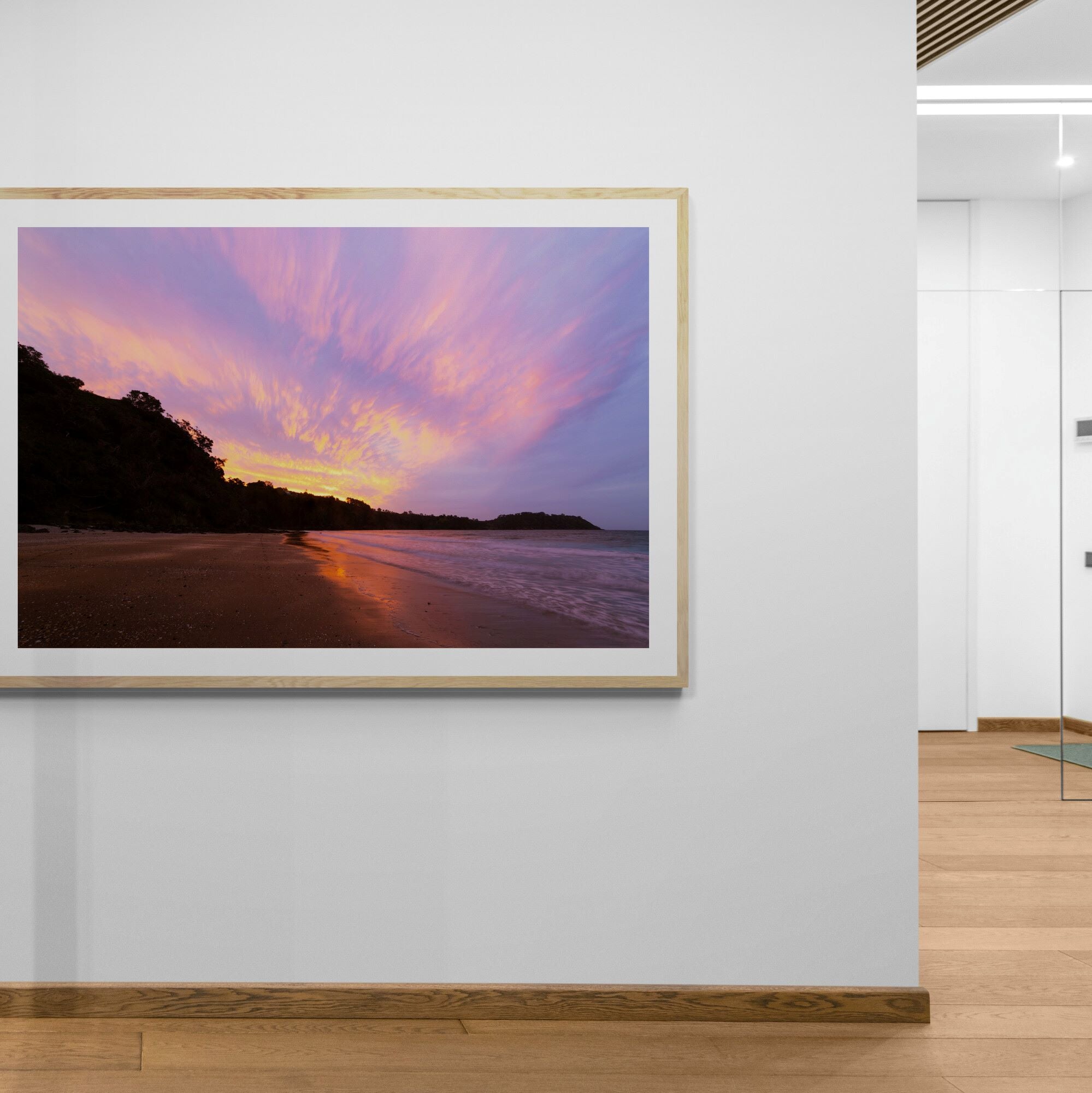 waiheke onetangi beach sunset print in hallway by Kirsten Clark art
