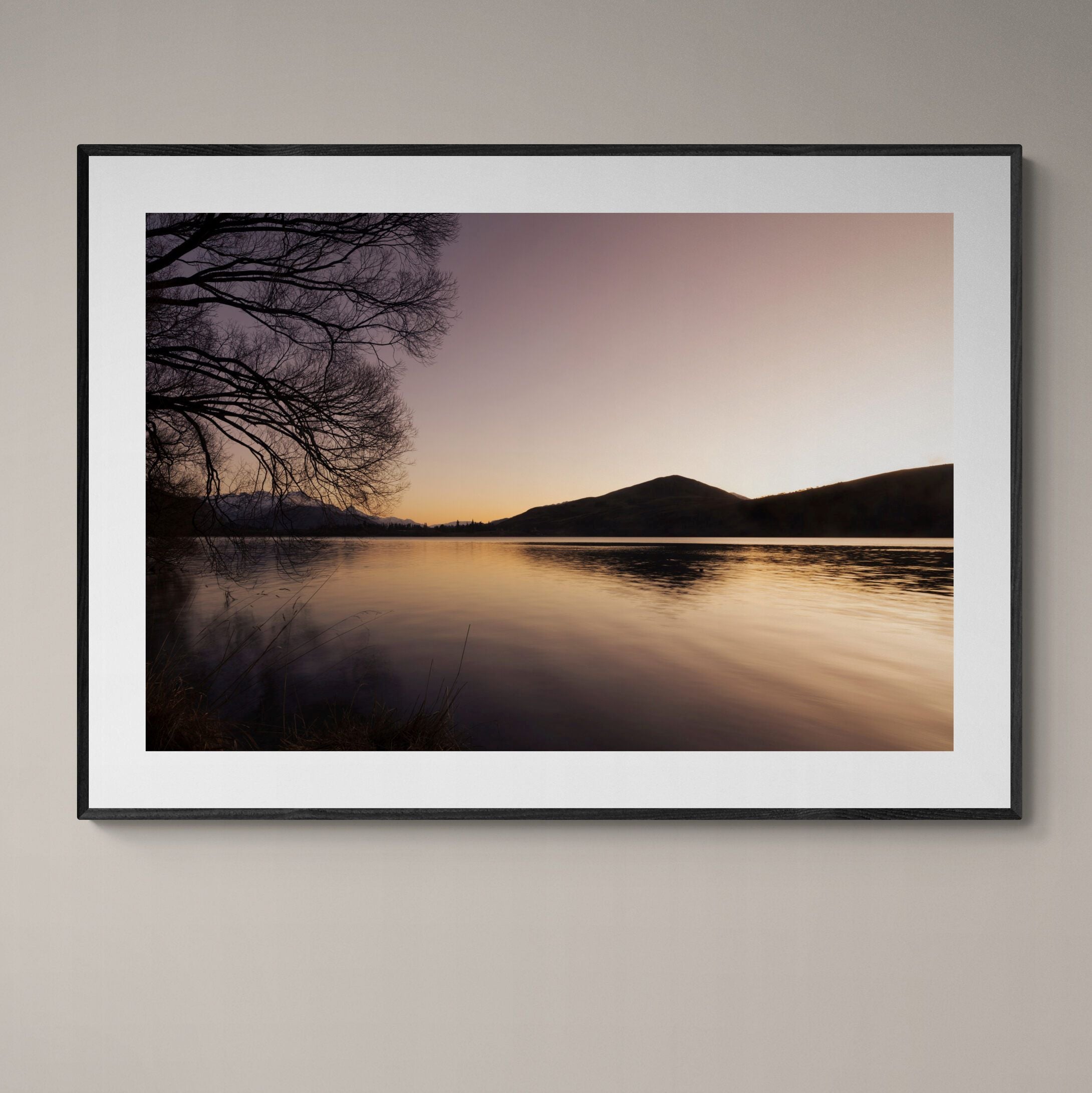 Lake Hayes fine art print with charcoal frame on wall by Kirsten Clark Art
