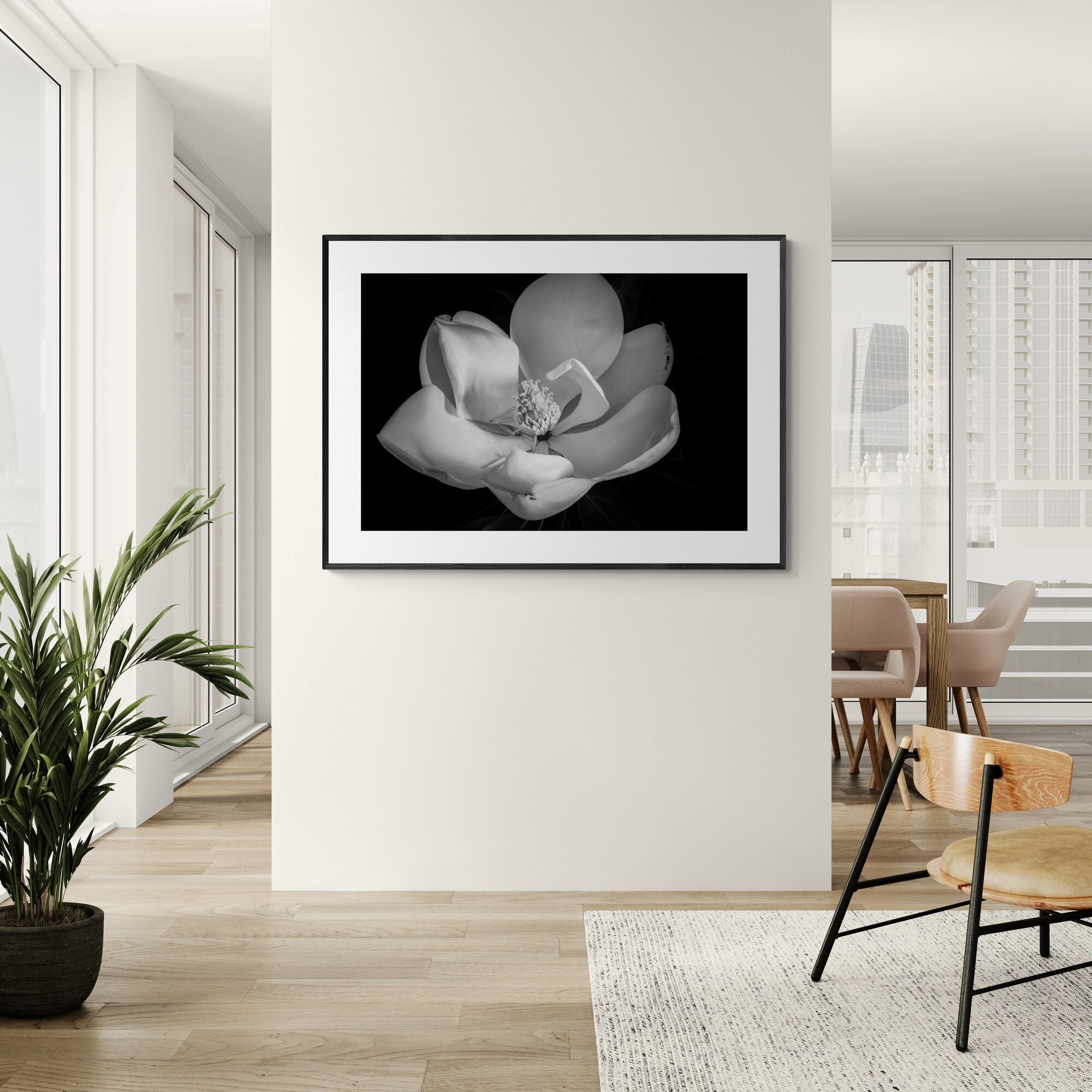Magnolia V black & white print on apartment wall by Kirsten Clark Art