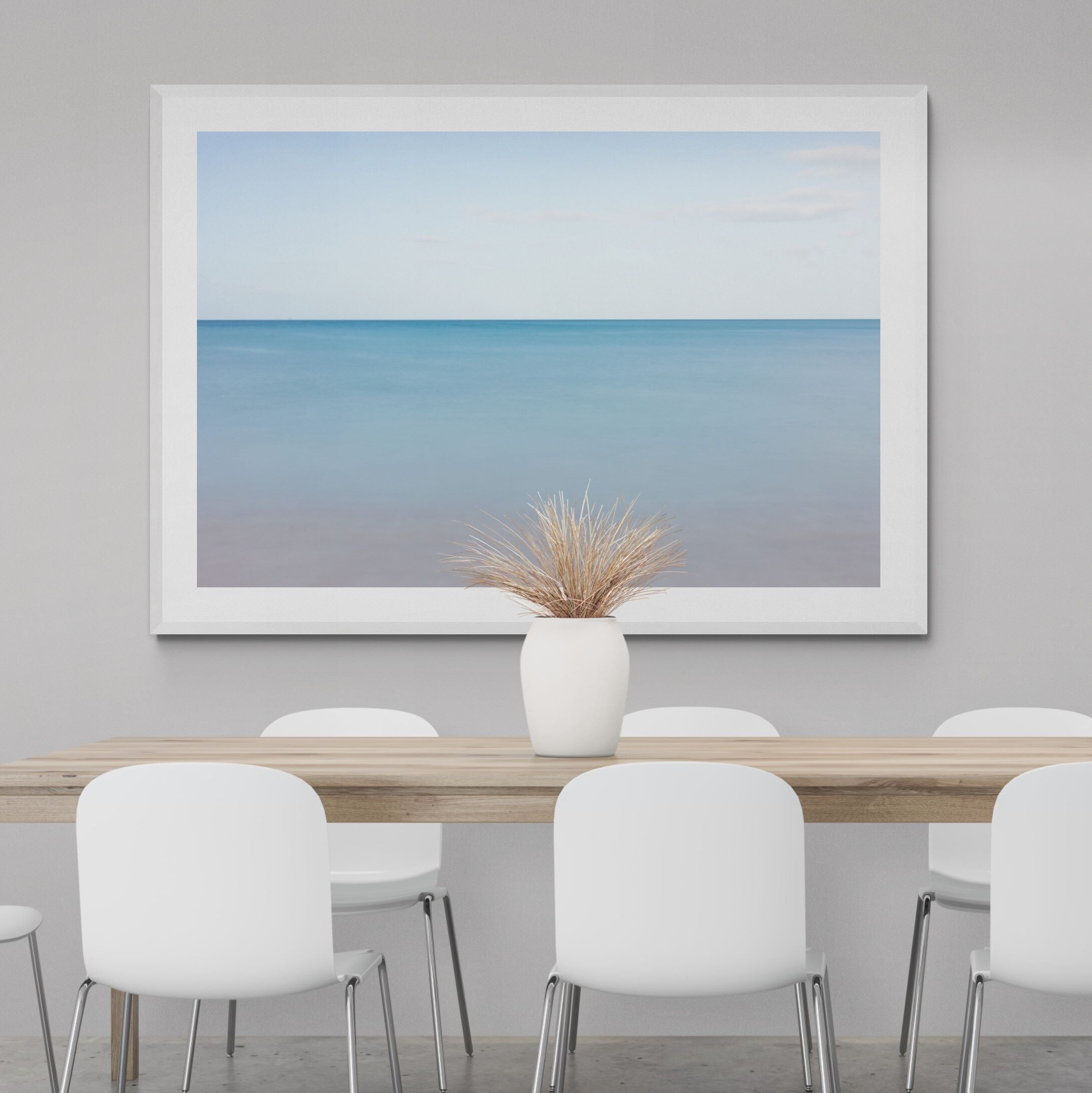 New Horizons Endless Summer print with white frame in dining area by Kirsten Clark Art