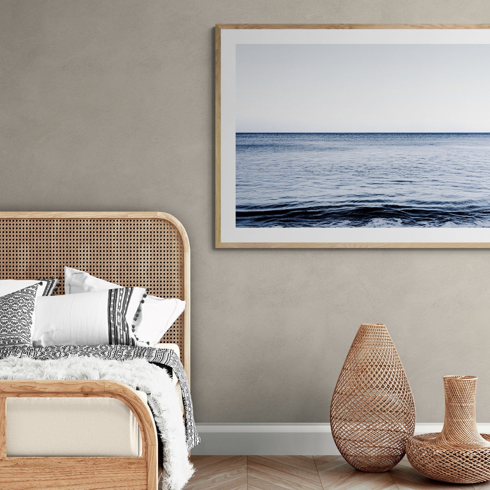 New Horizons Meditative Waters print with oak frame in bedroom by Kirsten Clark Art