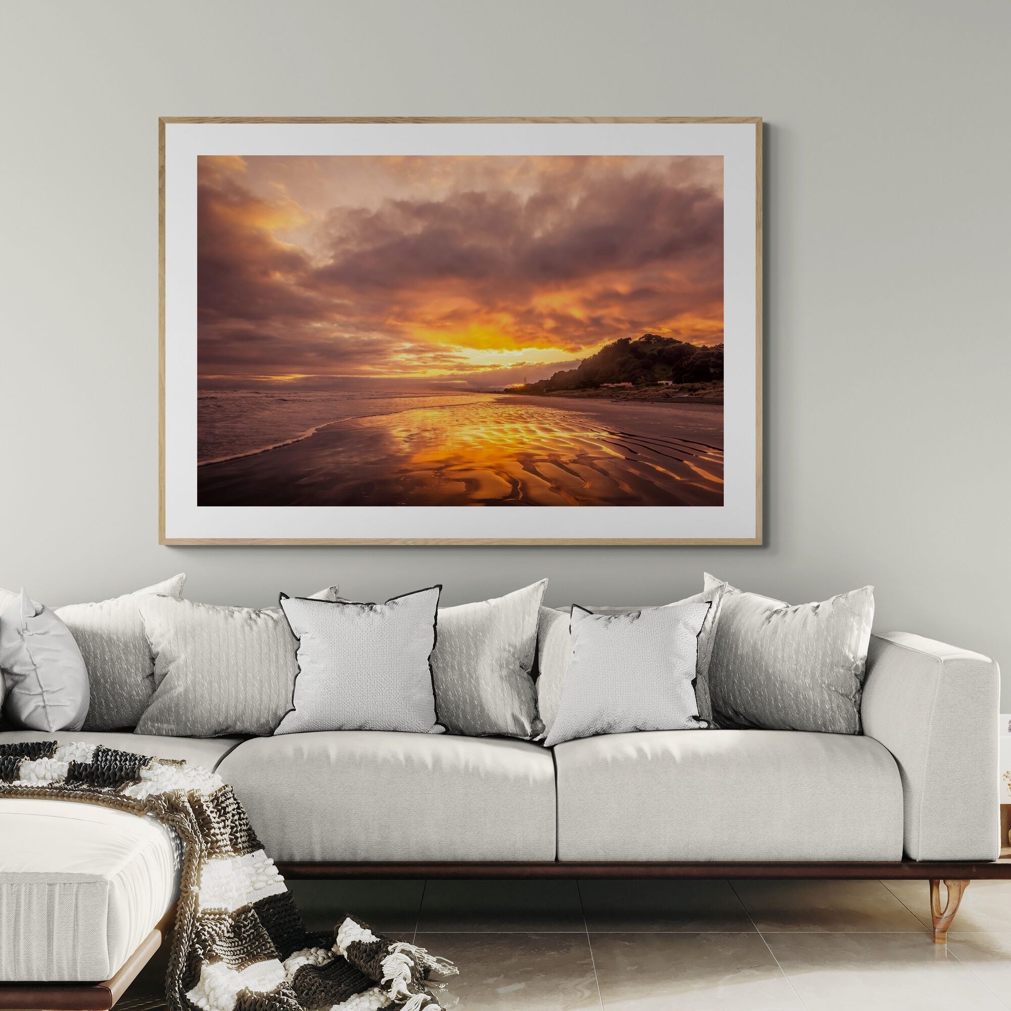 Ohope Sunrise fine art print in a neutral living room by Kirsten Clark Art