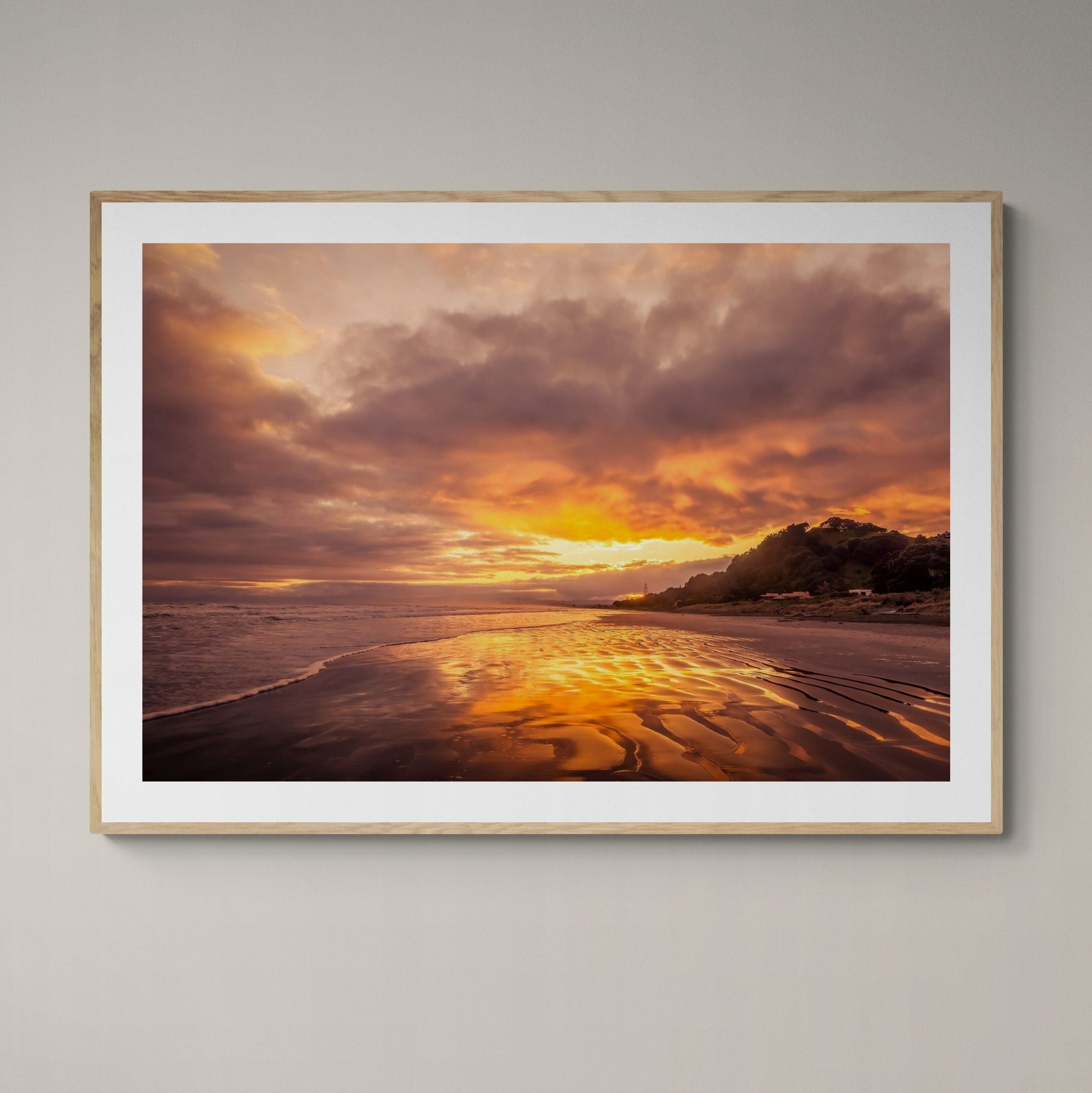 Ohope Sunrise Fine Art Print with natural frame on wall by Kirsten Clark Art