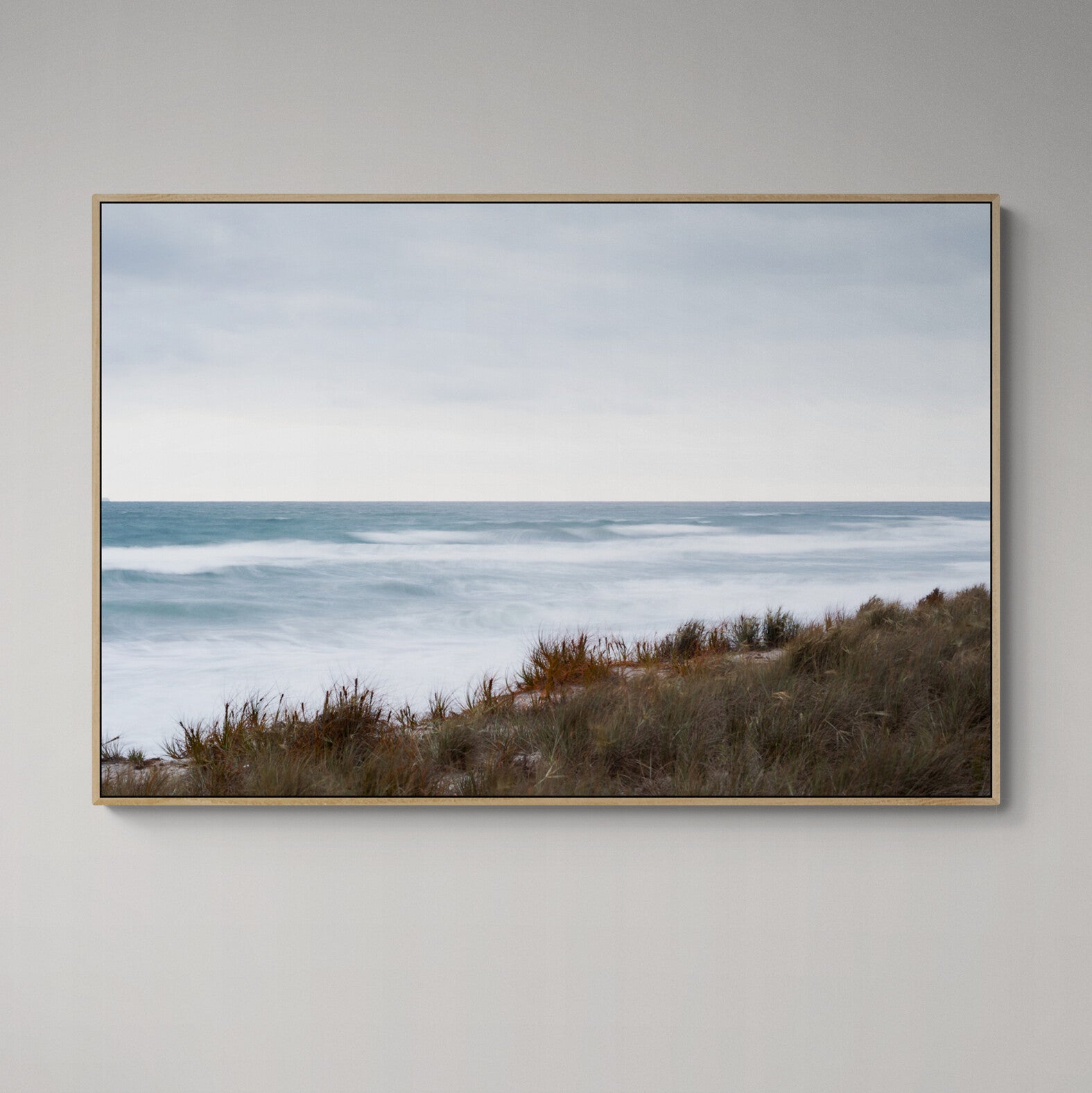 Papamoa Dunes canvas oak frame on wall