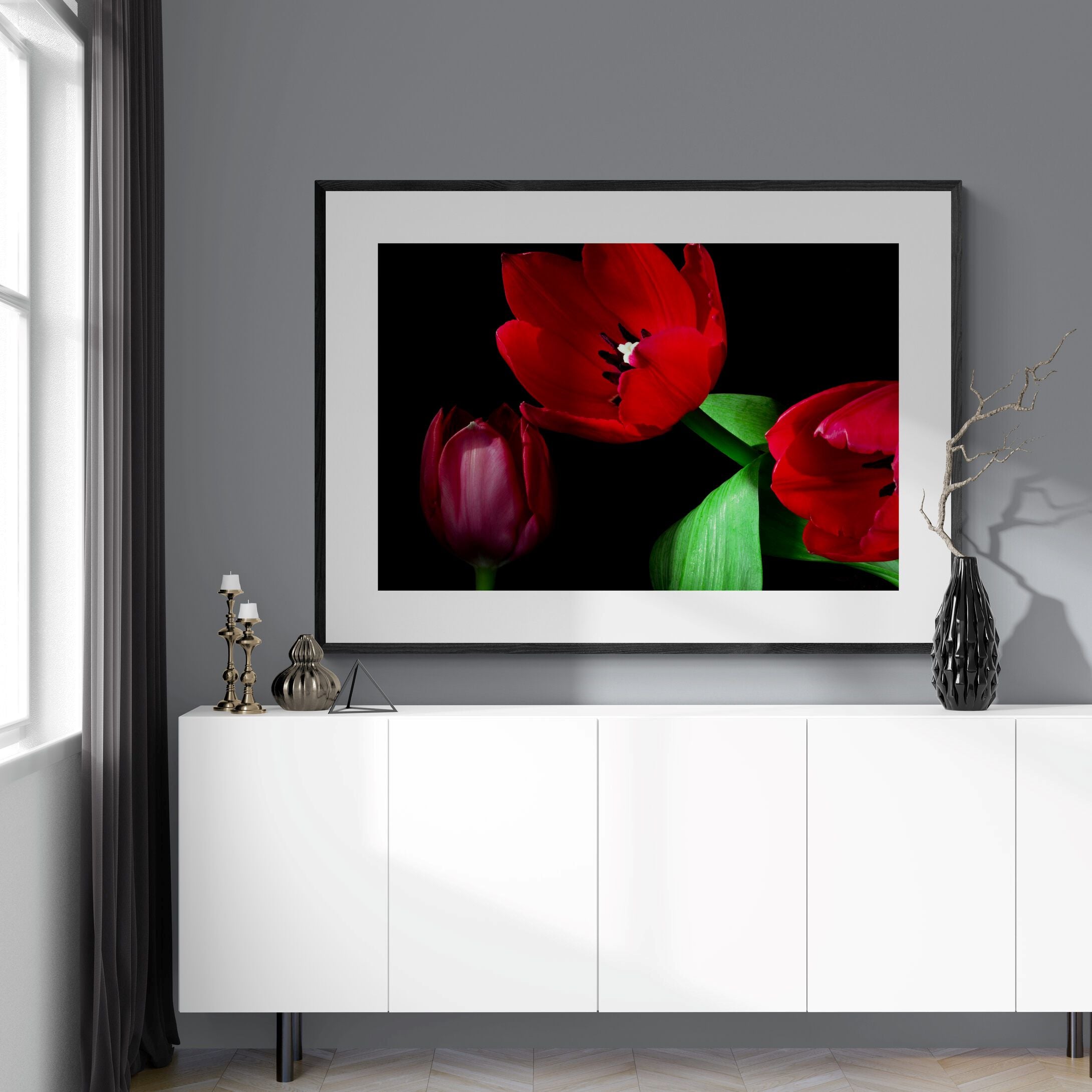 Red Tulips Print framed above white console by Kirsten Clark Art