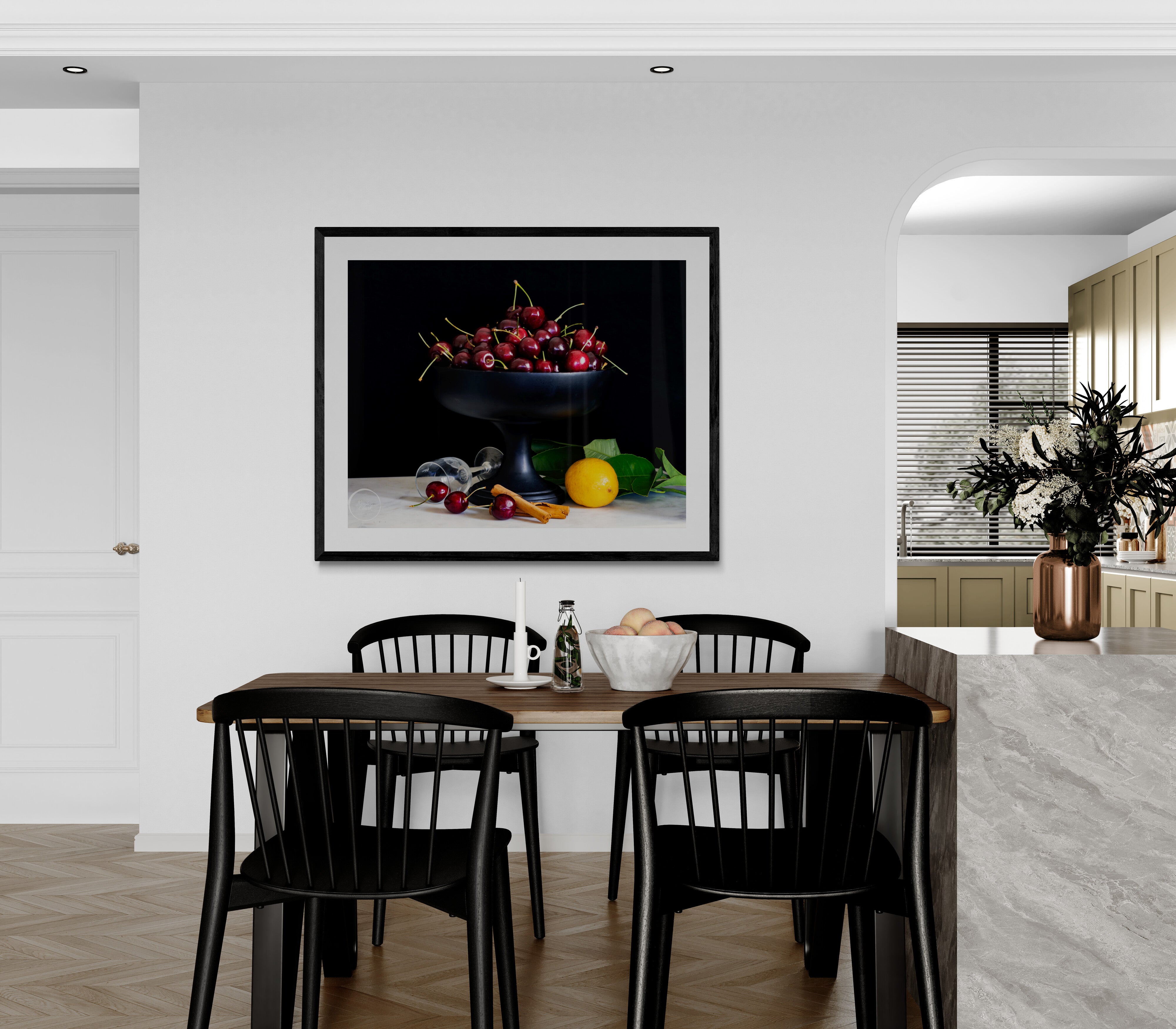 Bowl of cherries print on wall in dining space