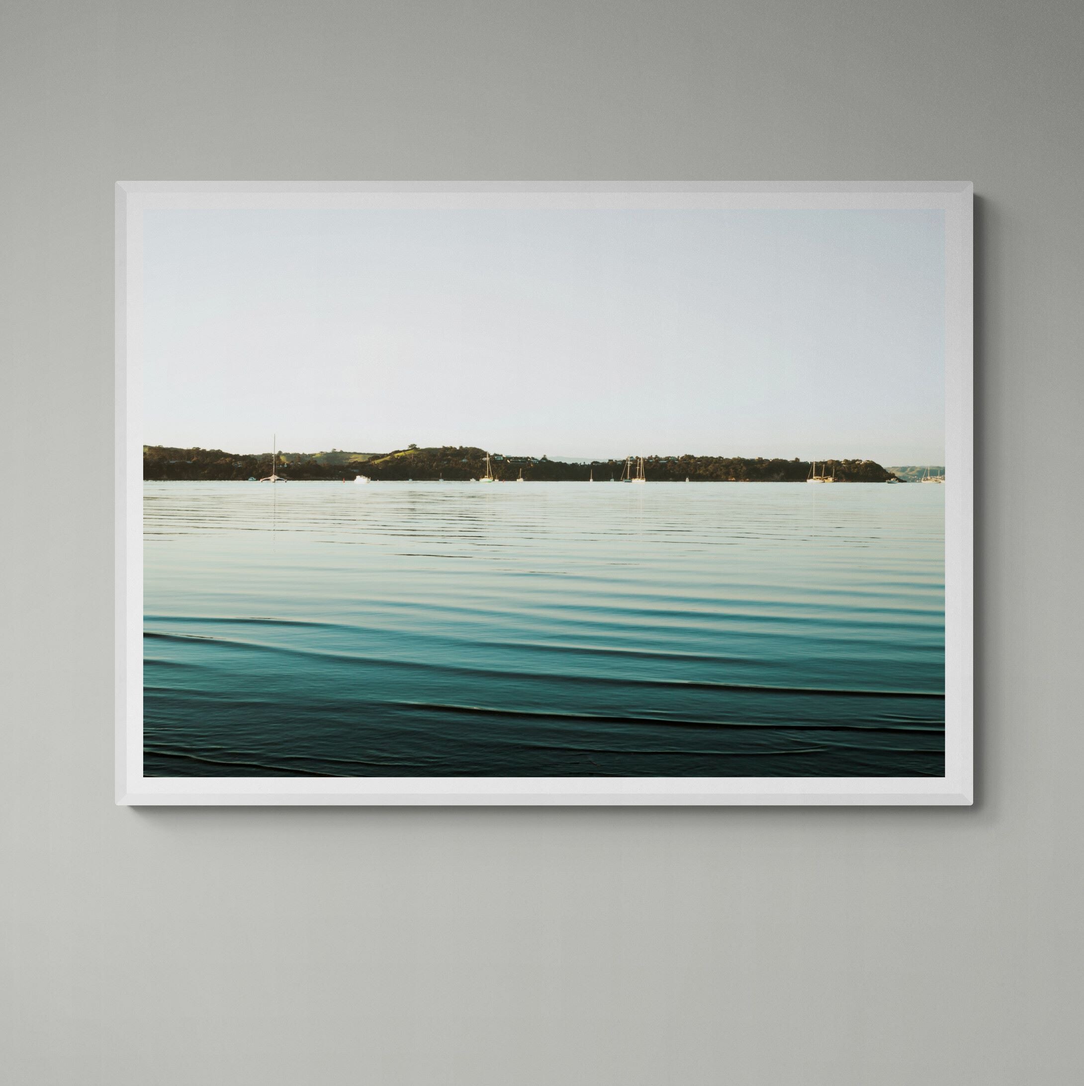 Waiheke Blackppol Beach Morning Ripples print framed on wall by Kirsten Clark Art