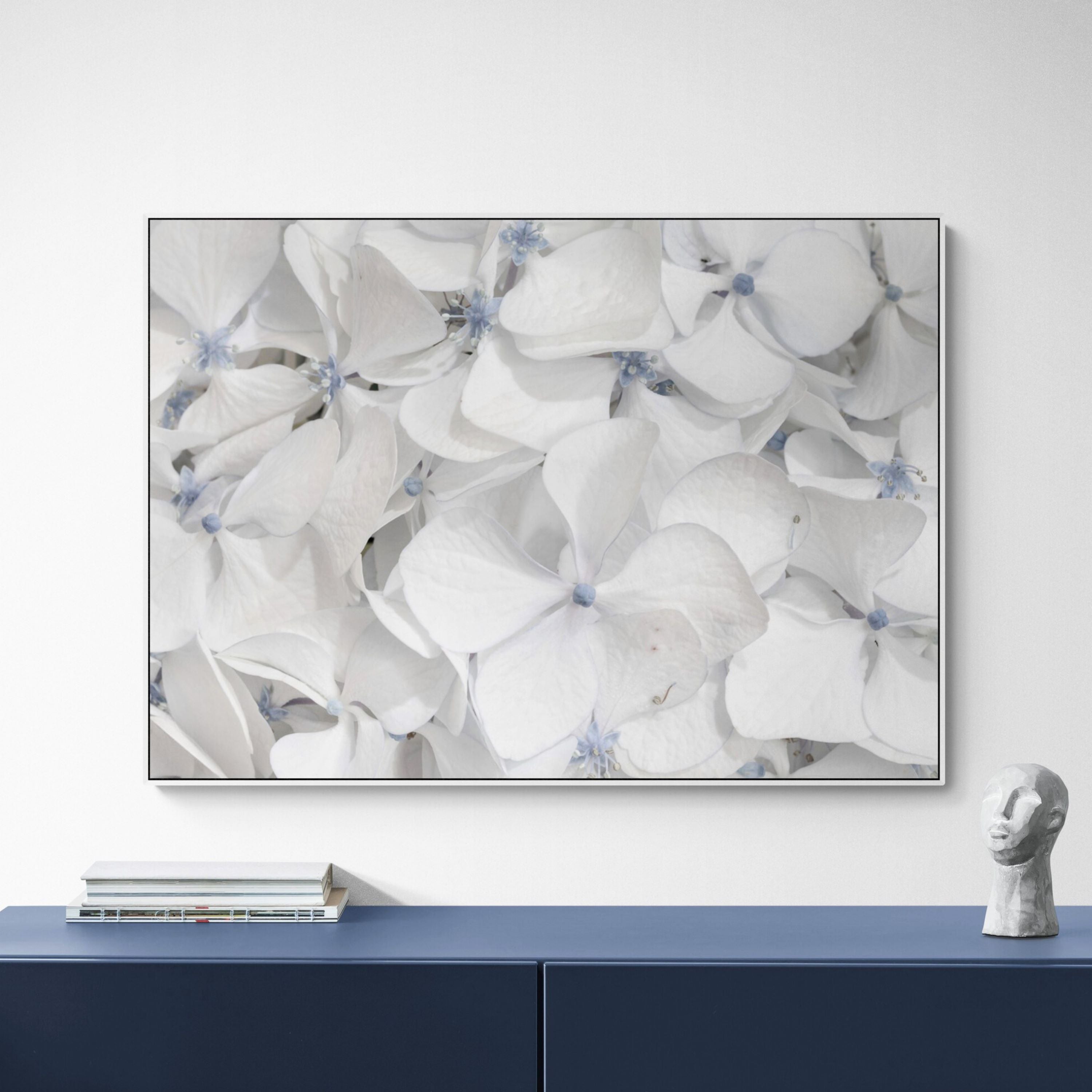White Hydrangeas Canvas Print above blue console Floral wall art