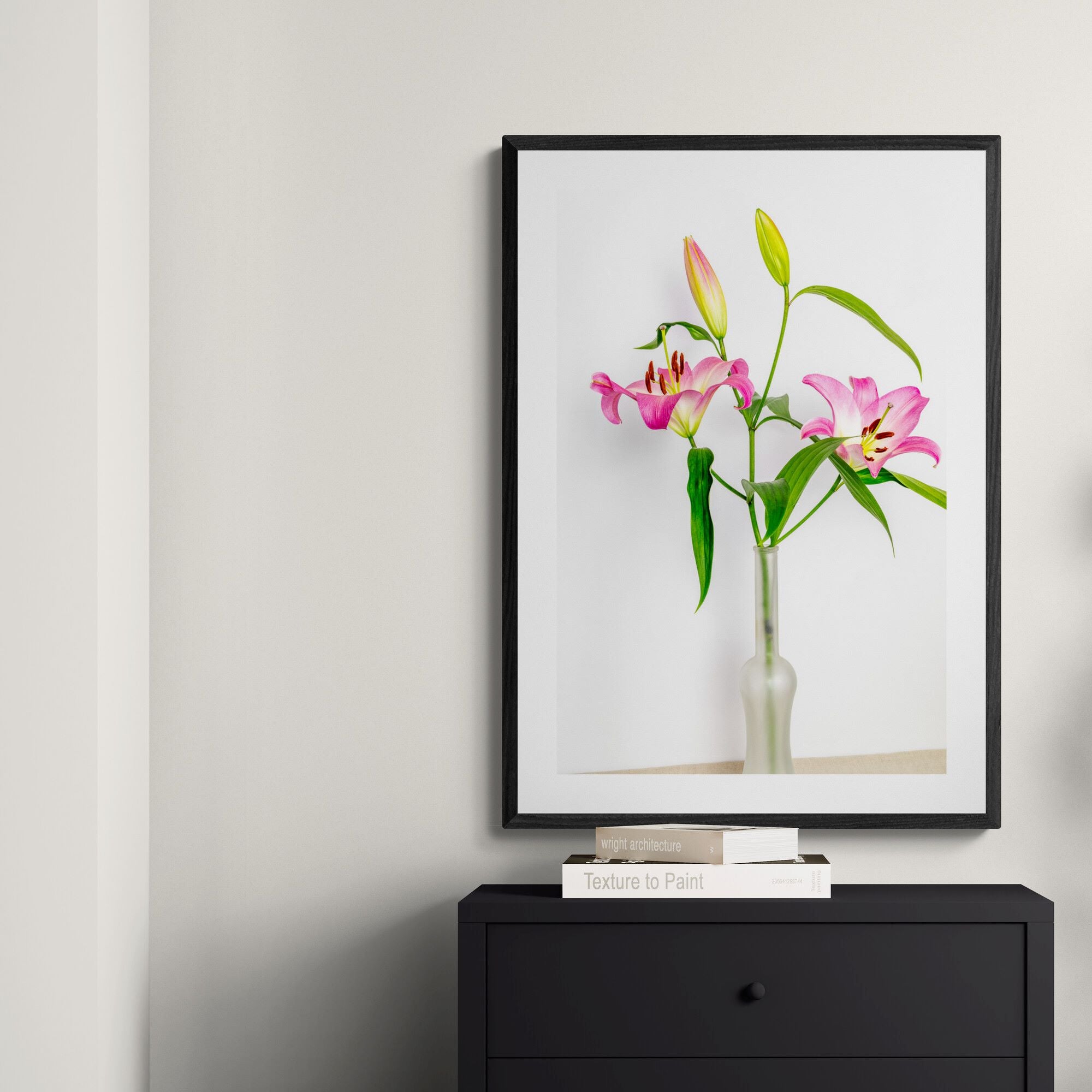 pink lilies in a vase print in room-above chest of drawers by Kirsten Clark Art