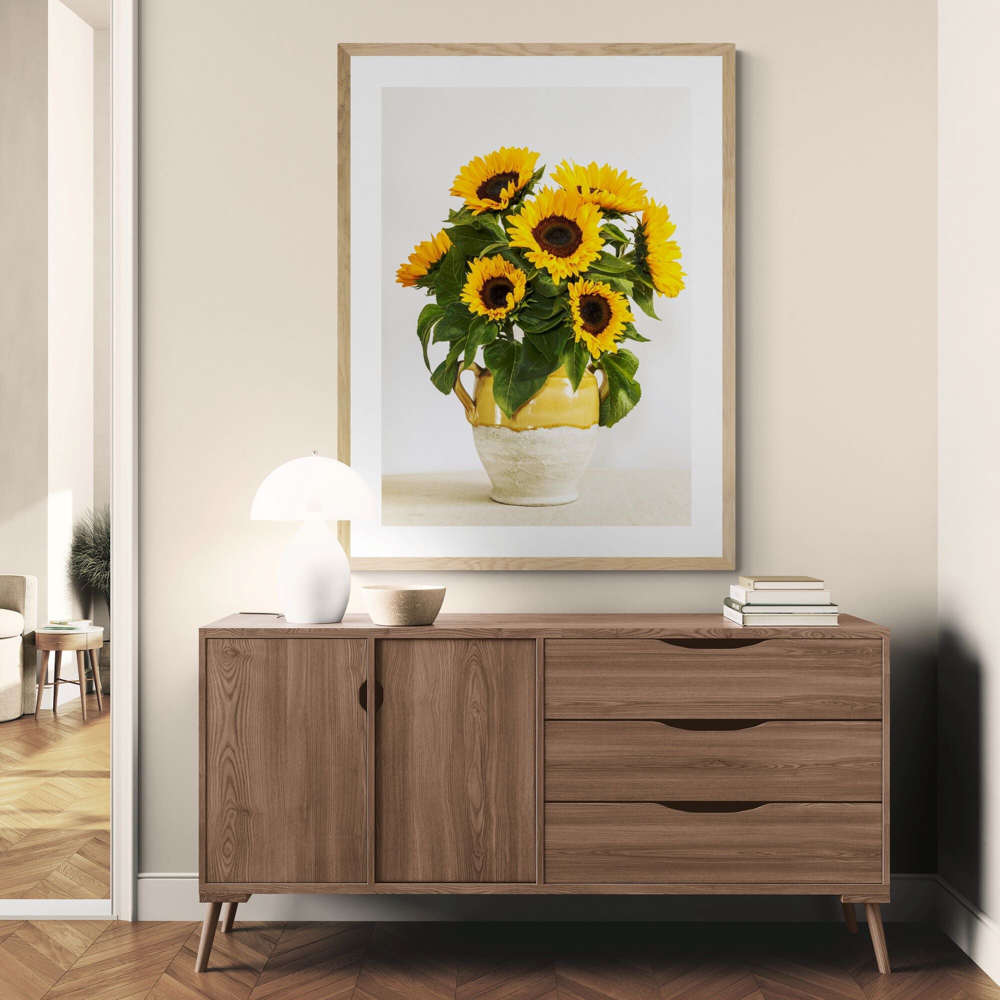 sunflowers in a rustic urn print above cabinet in living-room-entrance by Kirsten Clark Art