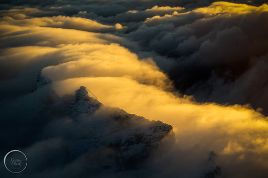 Sunrise in the Clouds Mt Aspiring National Park NZ Landscape print by Kirsten Clark